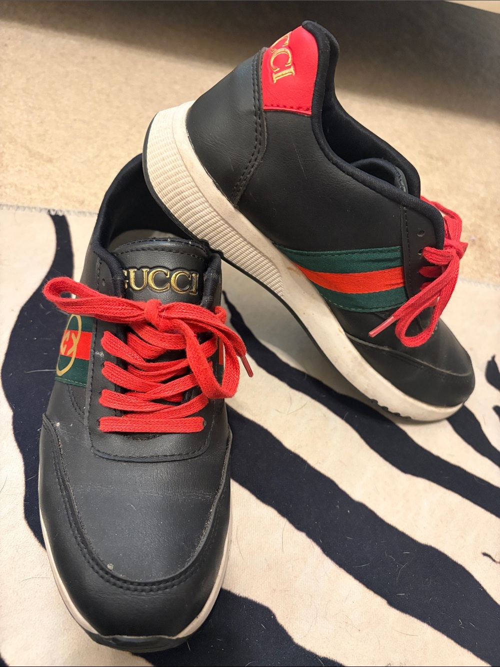 Black faux Leather Sneakers with Red Laces and Green-Red Stripe luxury trainers.